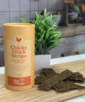 Chicky Chick Strips canister and air-dried chicken treats in a kitchen — Pip Eats
